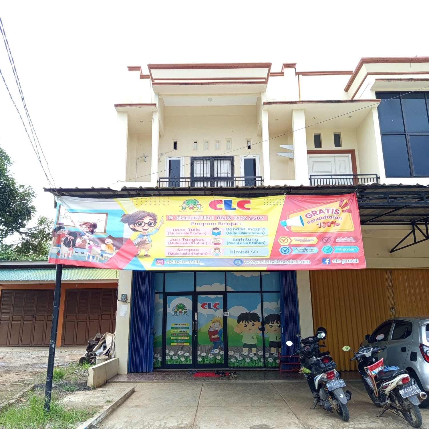 cartoon style modern kids learning center in a mall setting in Jakarta, bright and colorful