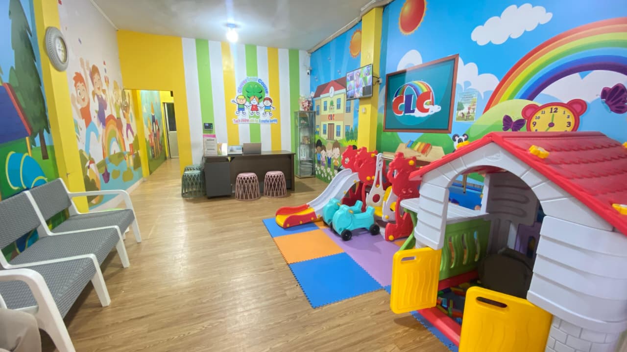 cartoon style modern kids learning center in a mall setting in Jakarta, bright and colorful