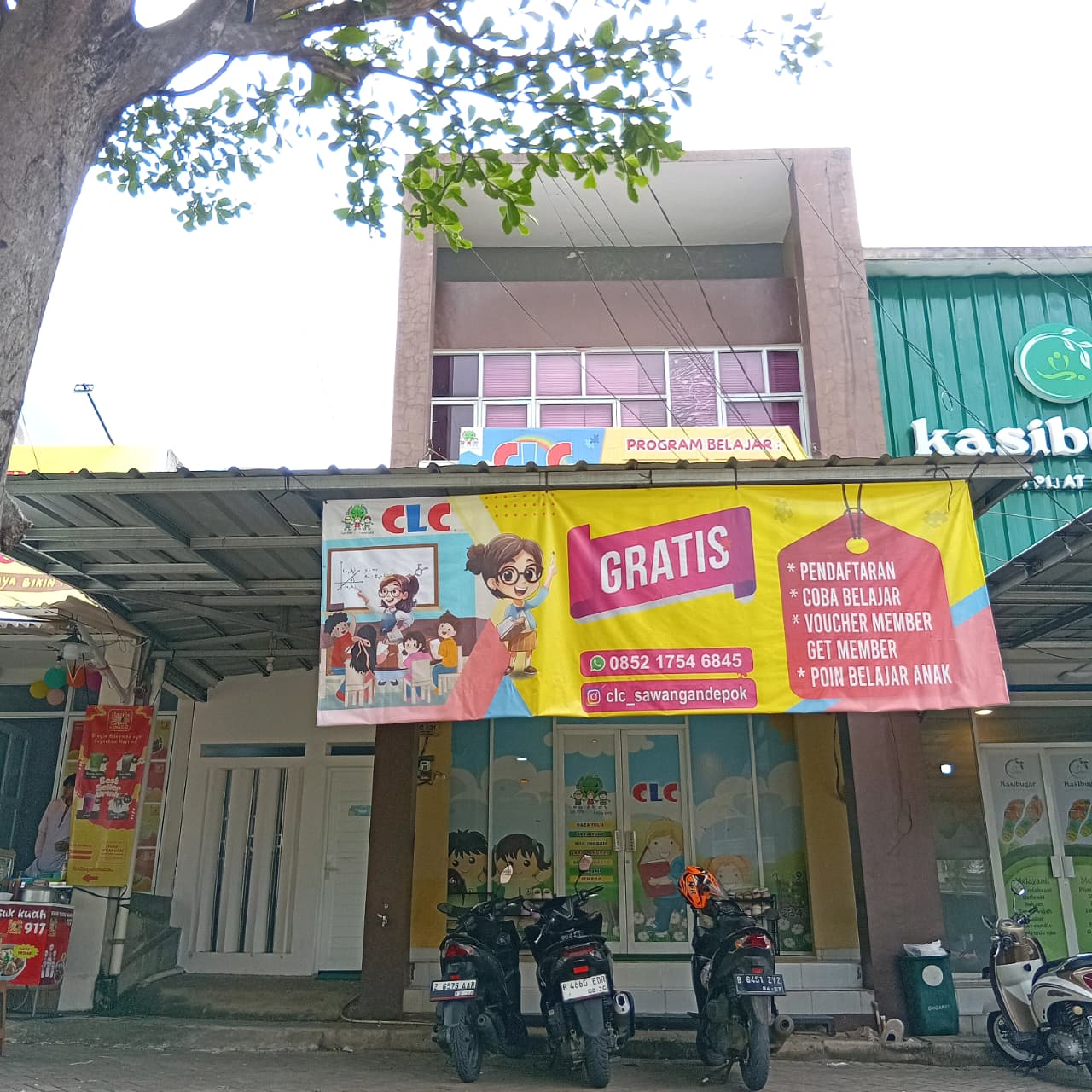 cartoon style modern kids learning center in a mall setting in Jakarta, bright and colorful