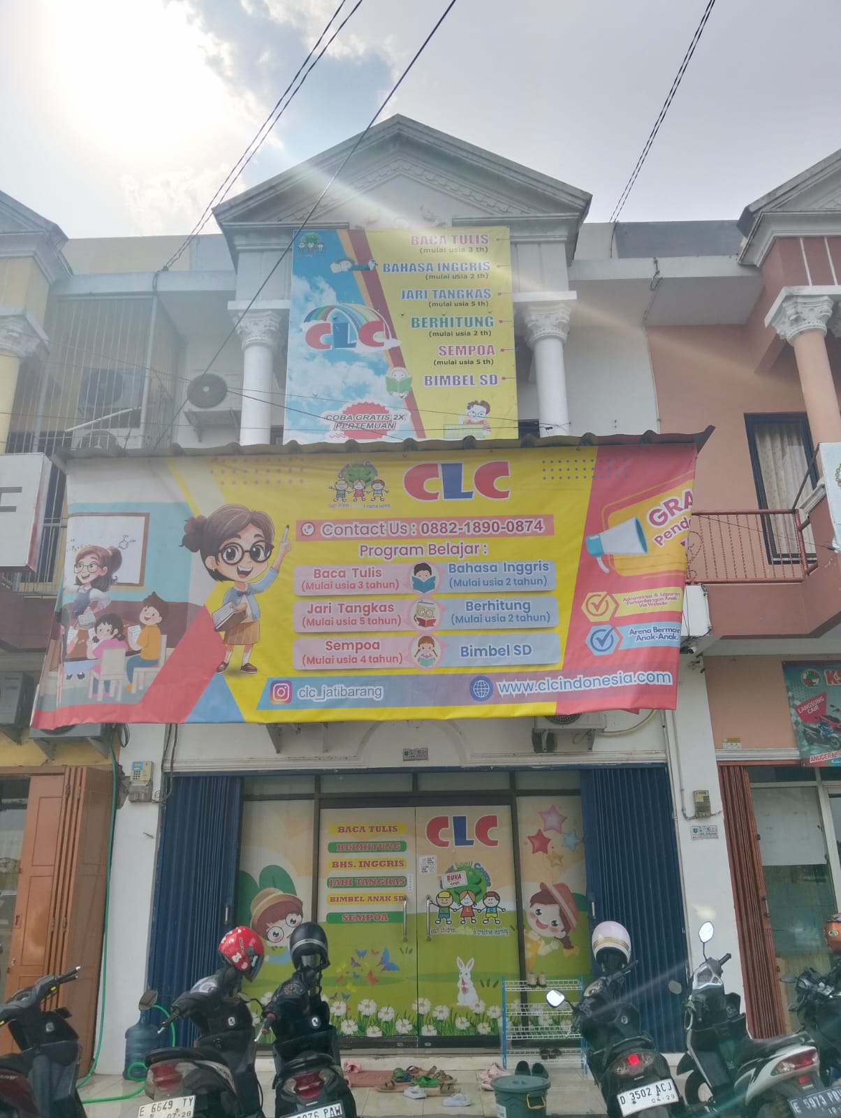 cartoon style modern kids learning center in a mall setting in Jakarta, bright and colorful
