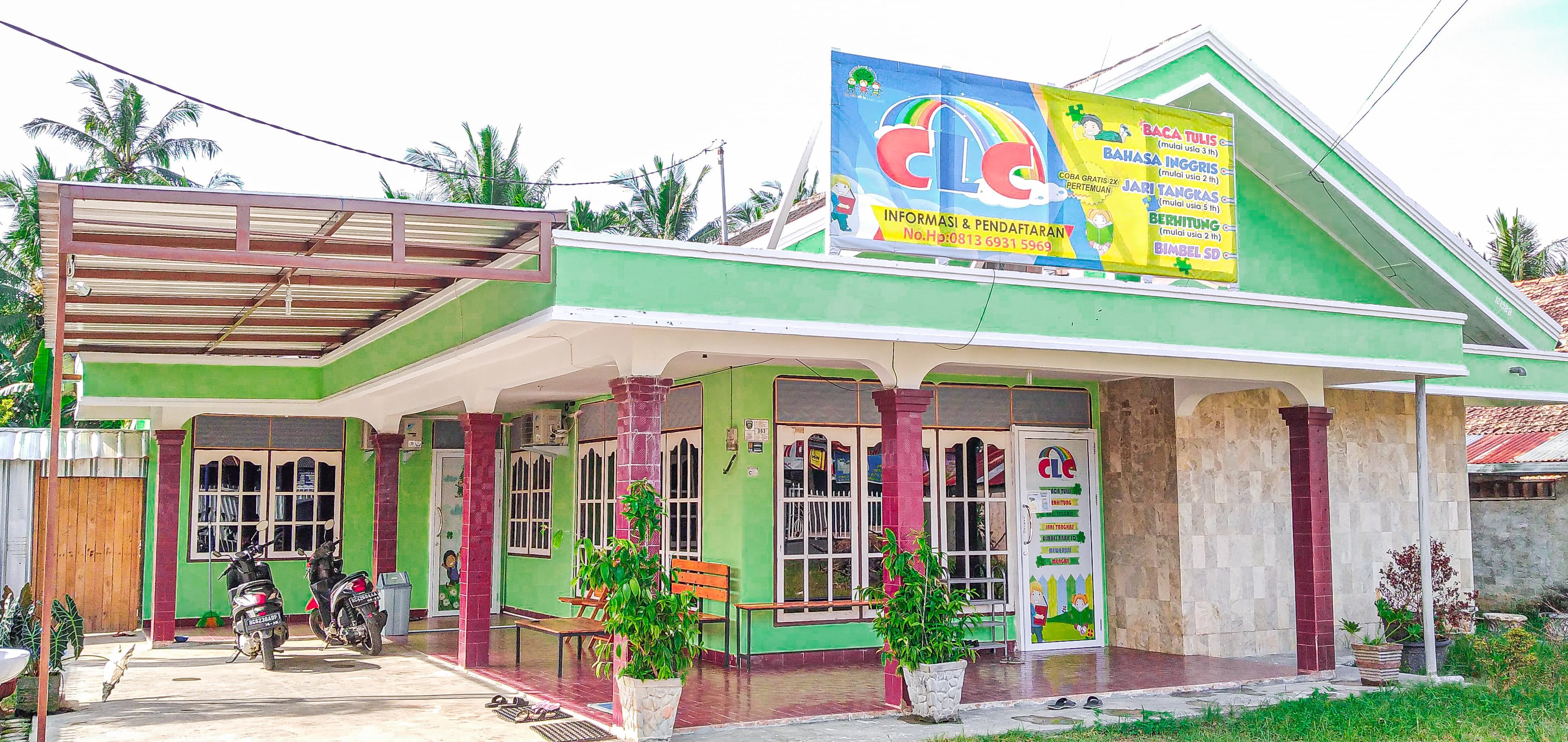 cartoon style modern kids learning center in a mall setting in Jakarta, bright and colorful
