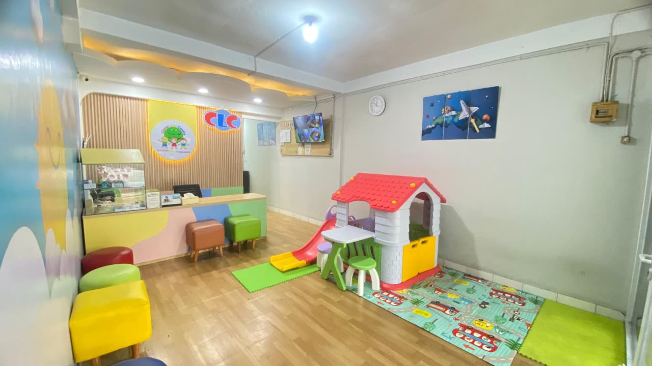 cartoon style modern kids learning center in a mall setting in Jakarta, bright and colorful