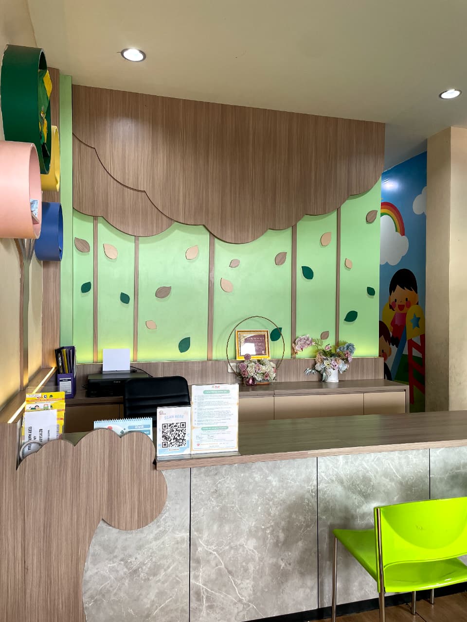 cartoon style modern kids learning center in a mall setting in Jakarta, bright and colorful
