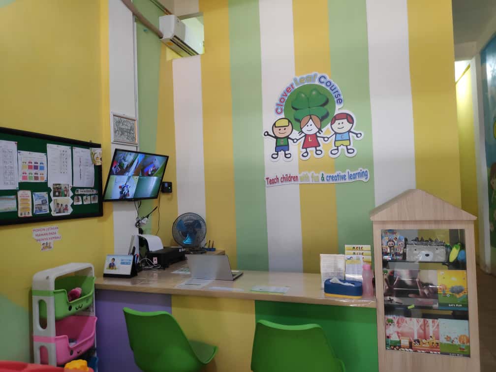 cartoon style modern kids learning center in a mall setting in Jakarta, bright and colorful