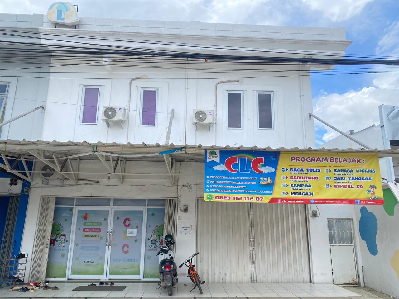 cartoon style modern kids learning center in a mall setting in Jakarta, bright and colorful