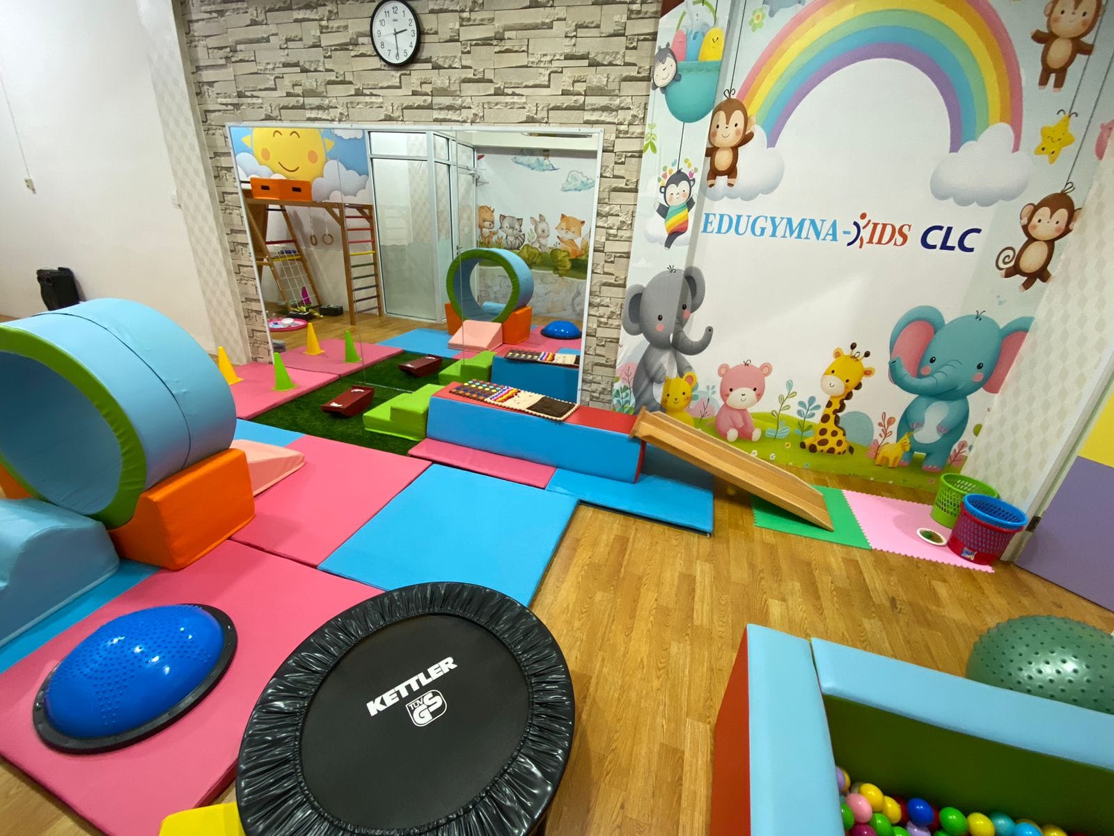 cartoon style modern kids learning center in a mall setting in Jakarta, bright and colorful