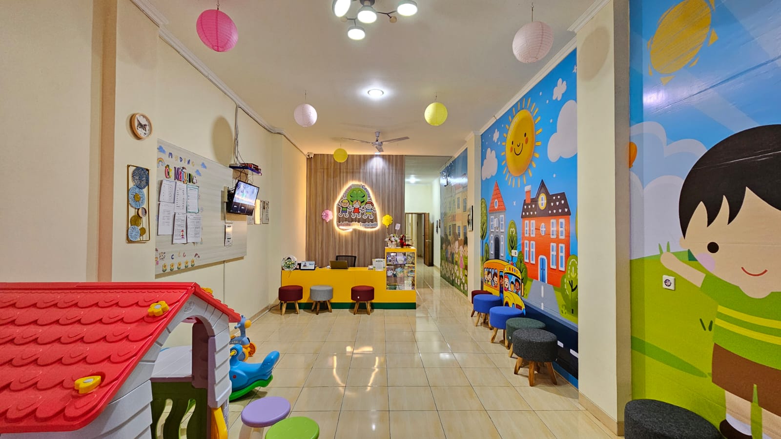 cartoon style modern kids learning center in a mall setting in Jakarta, bright and colorful