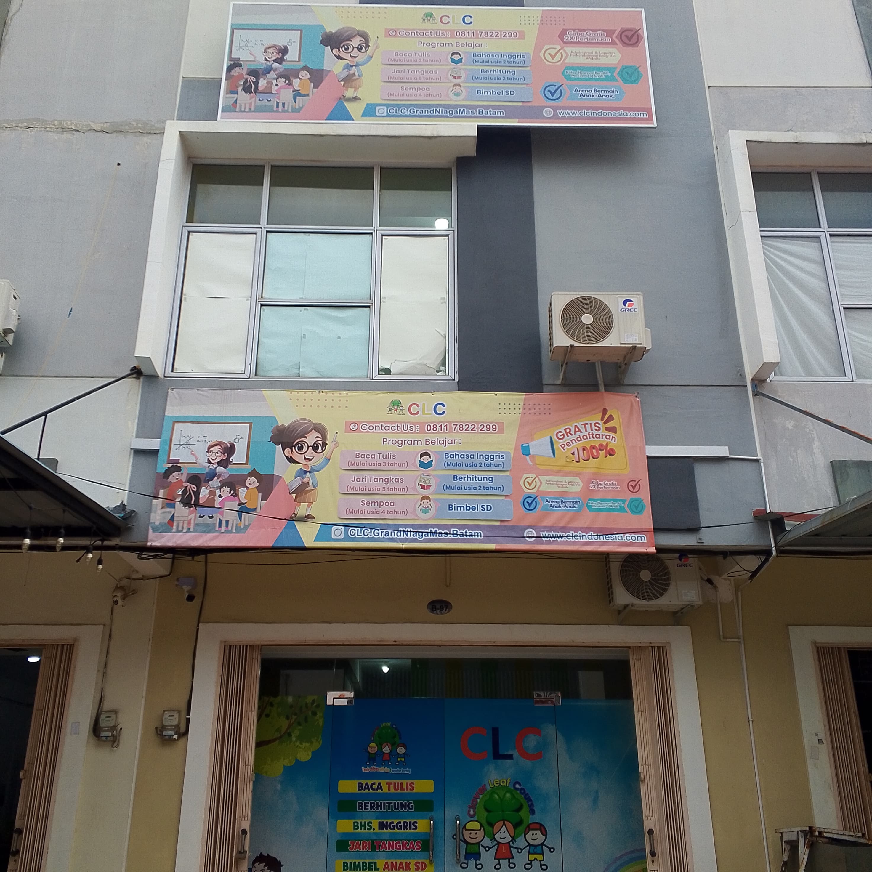 cartoon style modern kids learning center in a mall setting in Jakarta, bright and colorful