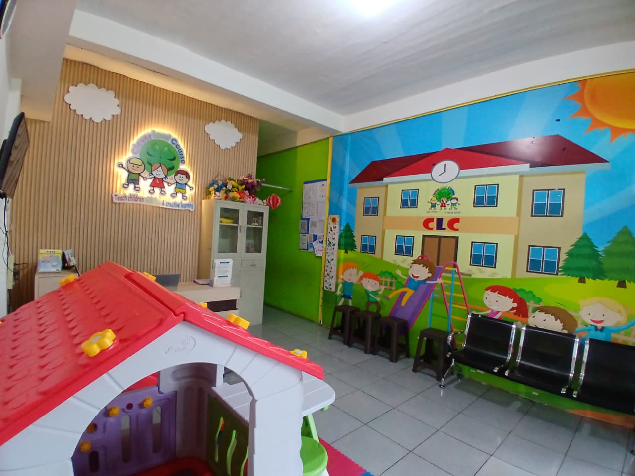 cartoon style modern kids learning center in a mall setting in Jakarta, bright and colorful