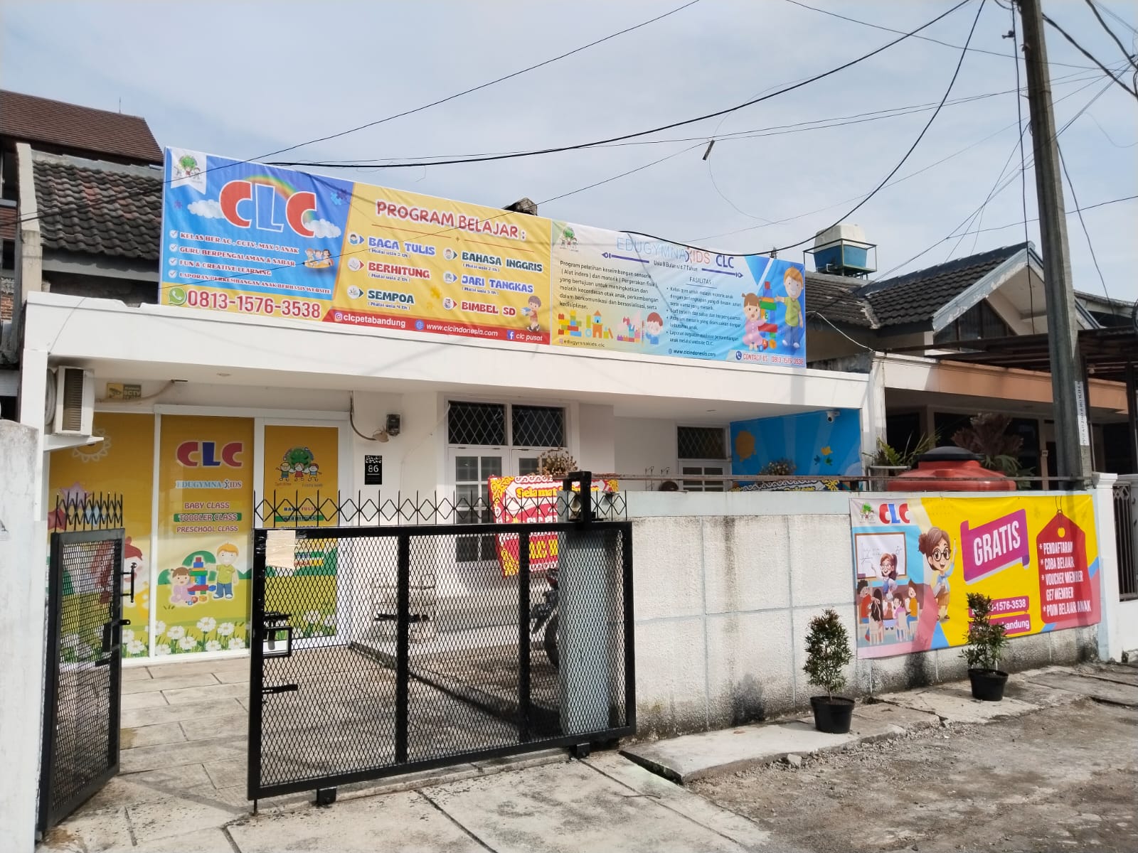 cartoon style modern kids learning center in a mall setting in Jakarta, bright and colorful