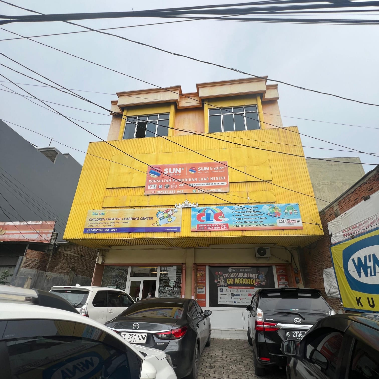 cartoon style modern kids learning center in a mall setting in Jakarta, bright and colorful