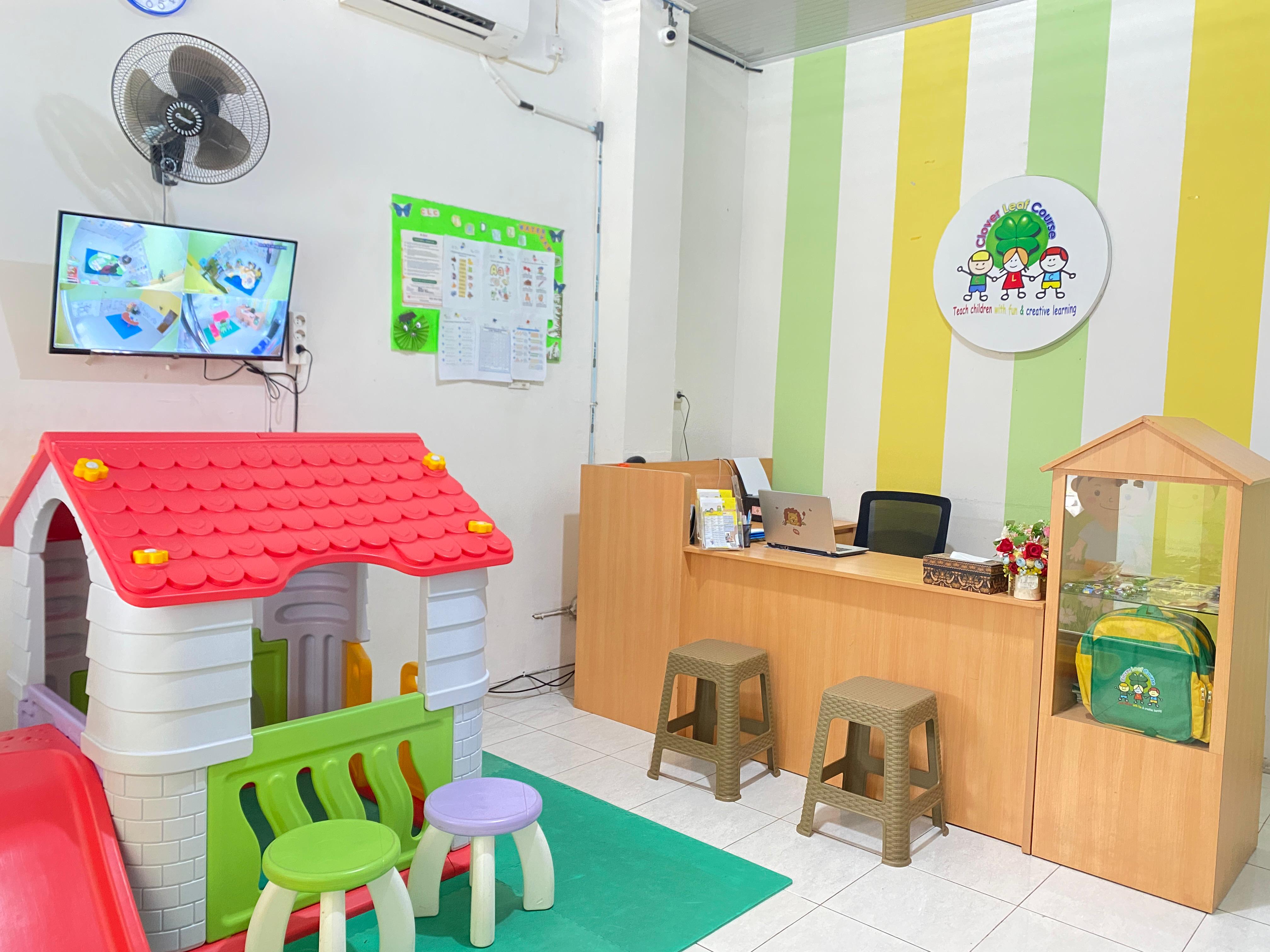 cartoon style modern kids learning center in a mall setting in Jakarta, bright and colorful