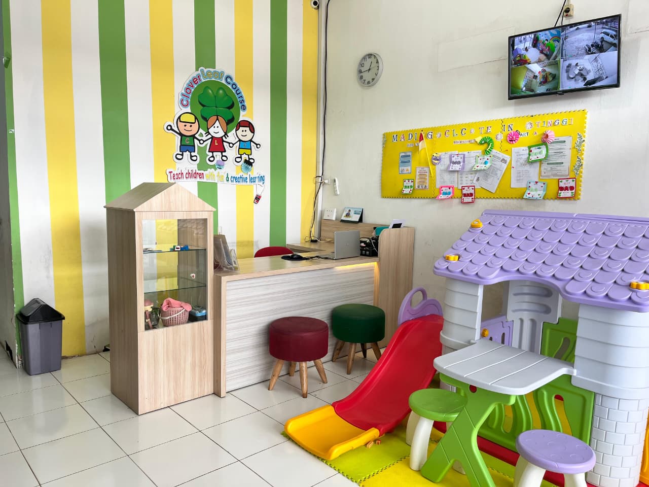cartoon style modern kids learning center in a mall setting in Jakarta, bright and colorful