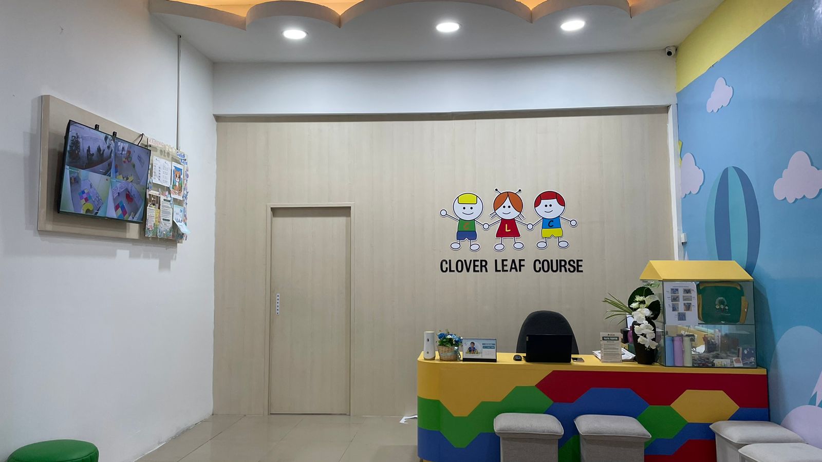 cartoon style modern kids learning center in a mall setting in Jakarta, bright and colorful