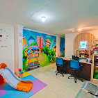 cartoon style modern kids learning center in a mall setting in Jakarta, bright and colorful