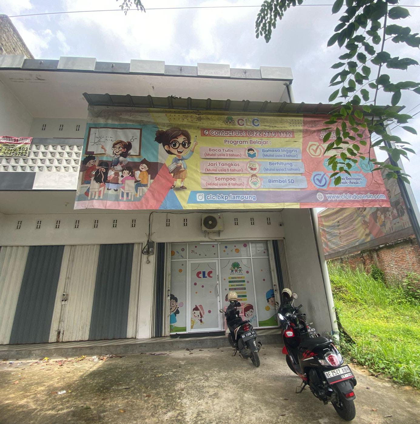 cartoon style modern kids learning center in a mall setting in Jakarta, bright and colorful