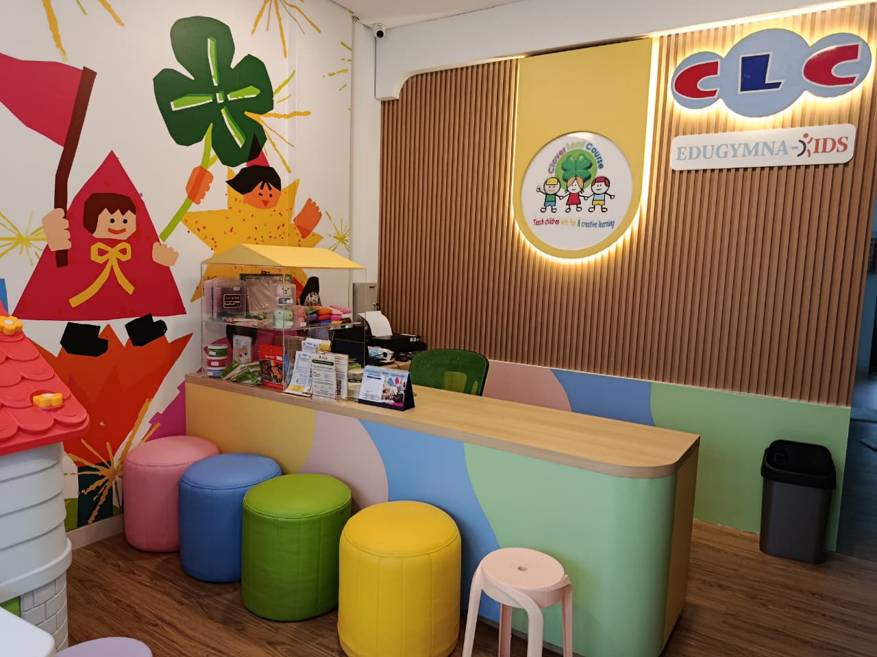 cartoon style modern kids learning center in a mall setting in Jakarta, bright and colorful