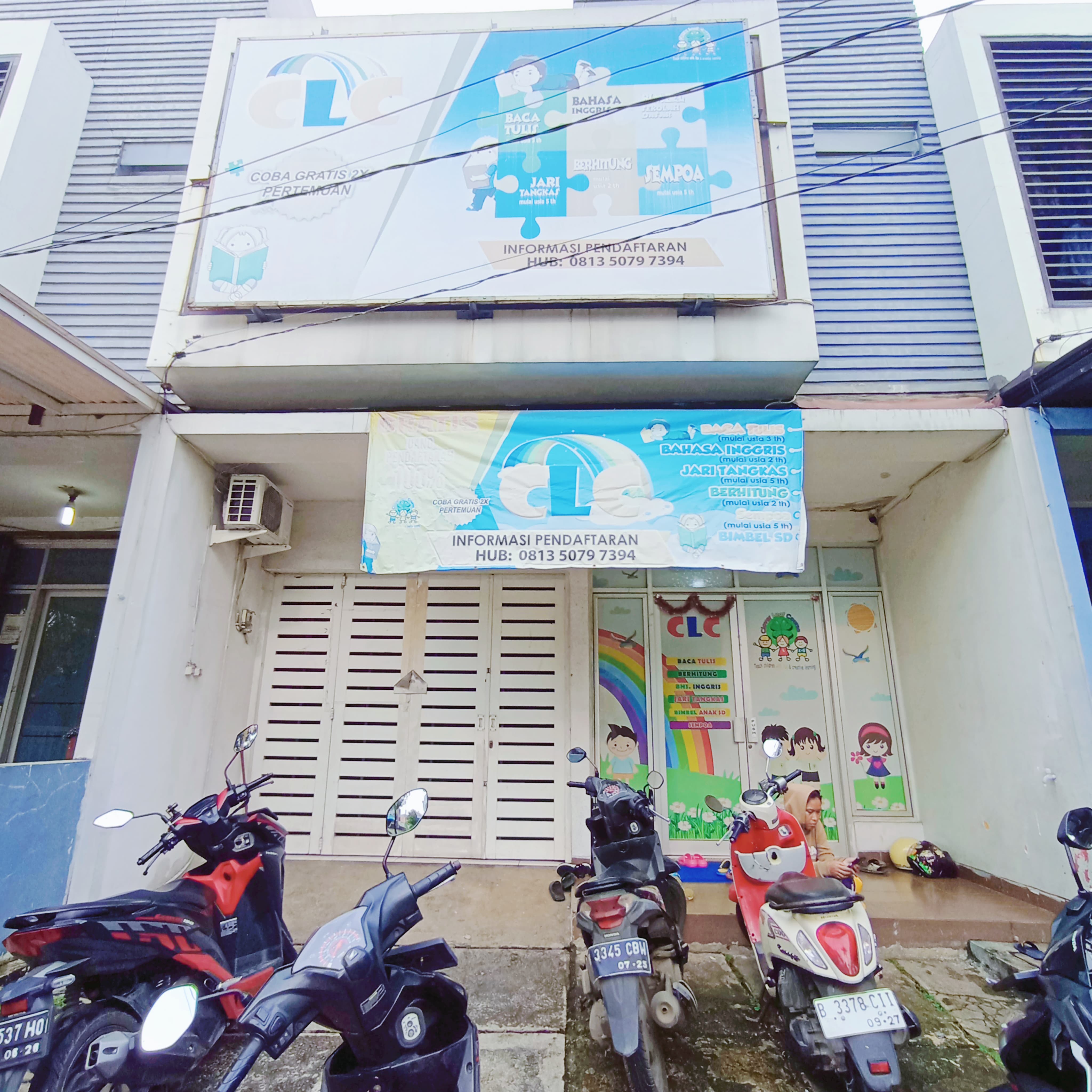 cartoon style modern kids learning center in a mall setting in Jakarta, bright and colorful